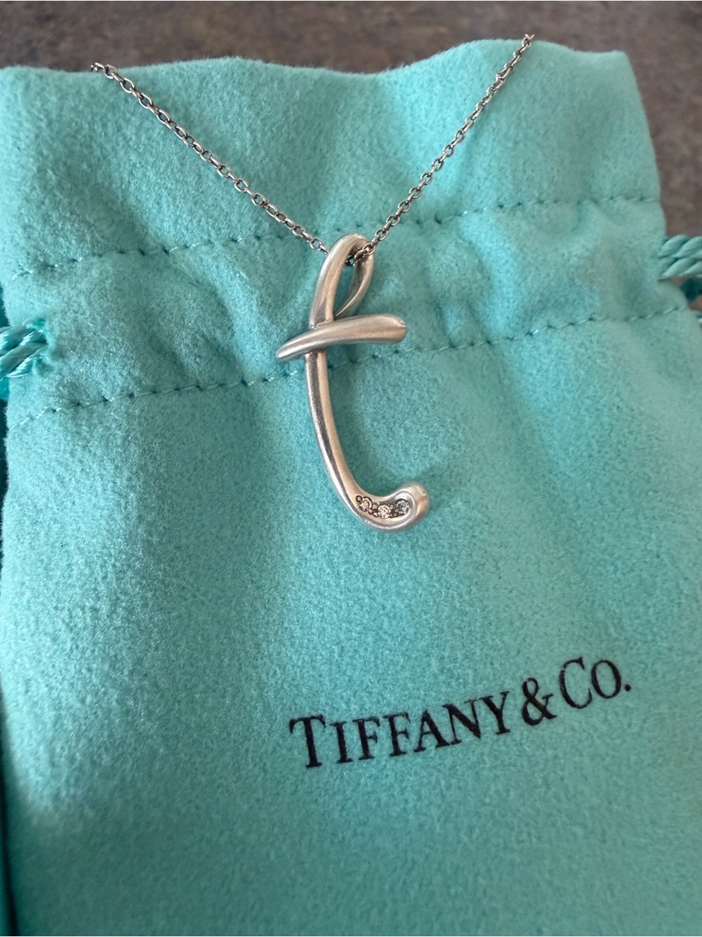 Tiffany & Co. Alphabet Pendant ‘T’ in Sterling Silver with Diamonds